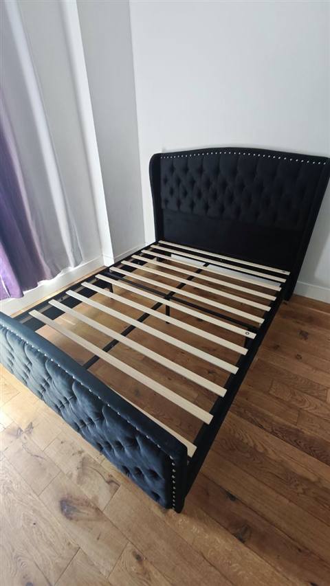 Tufted upholstered bed frame